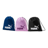 Three Puma Phase Gym Sacks in blue, pink, and black are displayed side by side. Each features the Puma logo—white on blue and black bags, purple on pink. These stylish drawstring sacks offer convenient storage for your gym essentials.