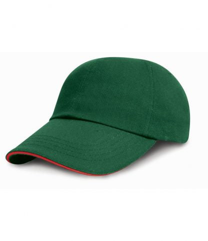 The Gray Nicolls Overbury CC Baseball Cap, in bottle green with a slightly curved brim and thin red edge accent, features the Overbury CC logo and is shown on a white background.