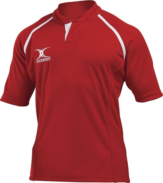 The Gilbert Xact Match Monochrome Rugby Shirt in red features white shoulder accents, a white Gilbert logo on the right chest, a high collar with V-shaped neckline, and durable sportswear fabric for comfort on and off the field.