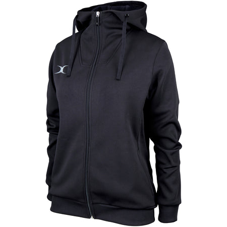 The Gilbert Pro Full Zip Womens Hoody by Gilbert comes in black with a high collar, attached hood with drawstrings, long sleeves, and a small white chest logo. Made from moisture-wicking fabric and shown on a plain white background.