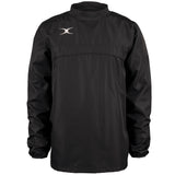 The Gilbert Photon Warm Up Top is a black, lightweight training top with a high collar, elastic cuffs, and a small white logo on the upper left chest. It offers a loose fit and comfort during warm-ups.