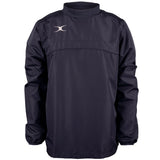 The Gilbert Photon Warm Up Top is a dark navy, long-sleeve sports top with a high collar, elastic cuffs, and a small white logo on the left chest. It’s water repellent and crafted from lightweight, durable material for training comfort.