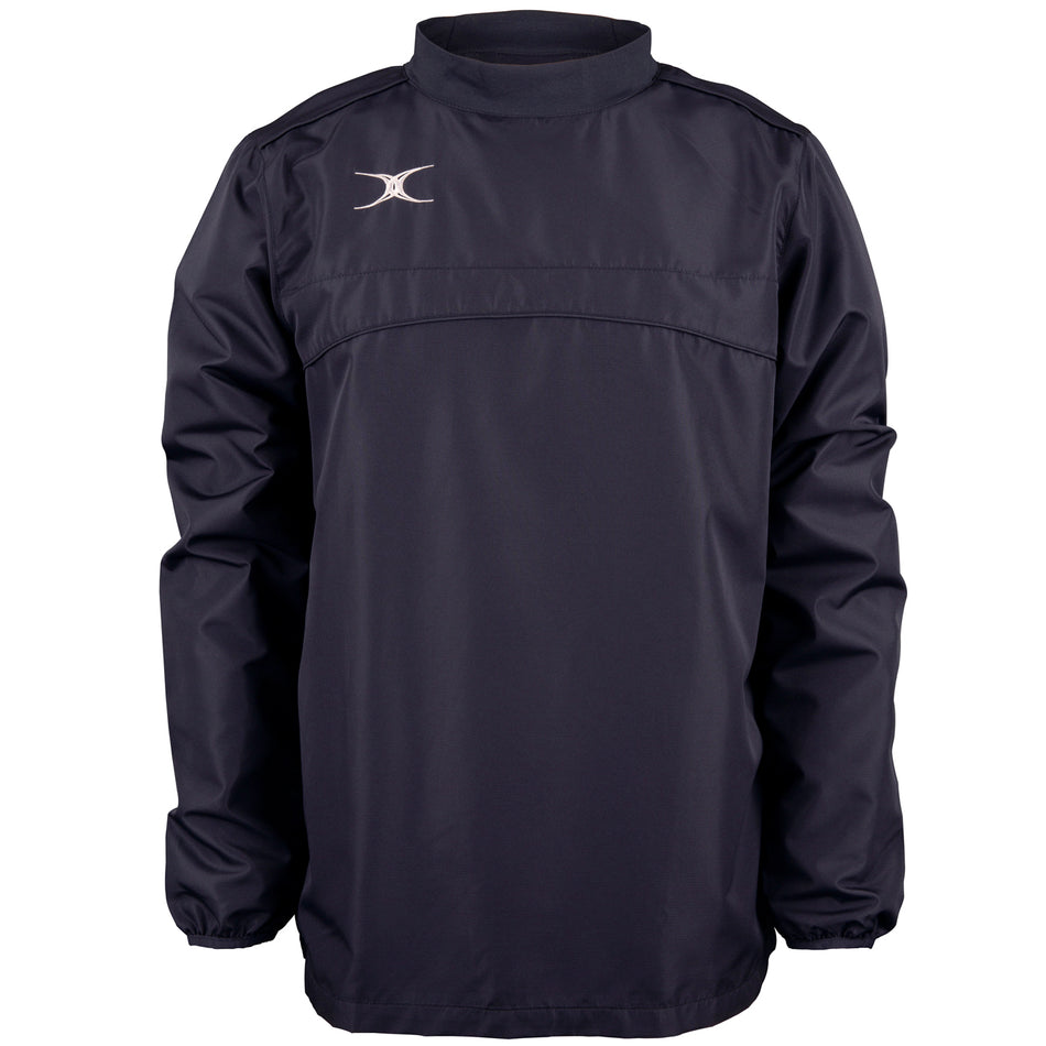 The Gilbert Photon Warm Up Top is a dark navy, long-sleeve sports top with a high collar, elastic cuffs, and a small white logo on the left chest. It’s water repellent and crafted from lightweight, durable material for training comfort.