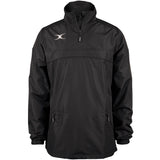 The Gilbert Photon 1/4 Zip Jacket by Gilbert is a black, water-repellent rugby jacket featuring a high collar, two front zippered pockets, elastic cuffs, and a small white logo on the left chest. Displayed on a plain white background.