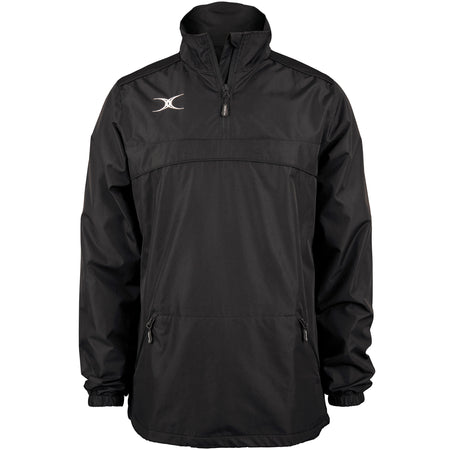 The Gilbert Photon 1/4 Zip Jacket by Gilbert is a black, water-repellent rugby jacket featuring a high collar, two front zippered pockets, elastic cuffs, and a small white logo on the left chest. Displayed on a plain white background.