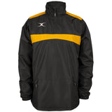 The Gilbert Photon 1/4 Zip Jacket by Gilbert features a black/gold design with a high collar, yellow chest stripe, zippered pockets, elastic cuffs, and a white logo on the upper left chest—ideal as water-repellent rugby warm up outerwear.