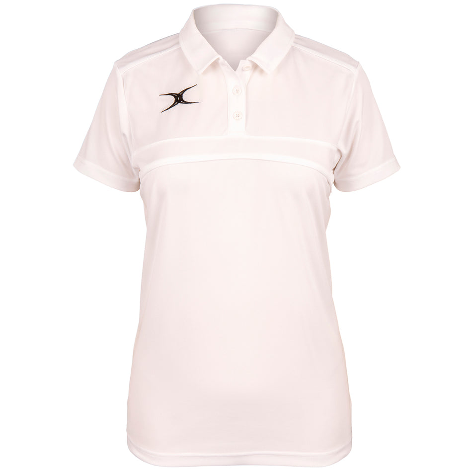 The Gilbert Womens Photon Polo is a white, short-sleeve collared shirt with three buttons and subtle black Gilbert logos on the chest and waist—perfect for high-performance training or women’s rugby apparel collections.