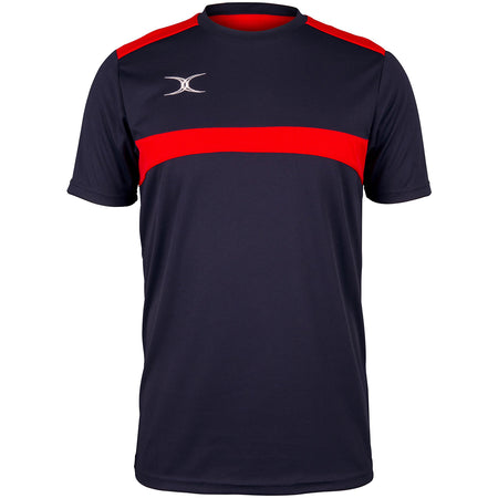The Gilbert Photon Tee by Gilbert is a dark navy and red short-sleeved gym training shirt featuring a bold red horizontal chest stripe, moisture control fabric, and a small silver logo on the upper left.