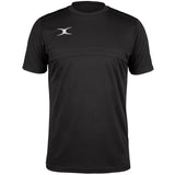 The Gilbert Photon Tee by Gilbert is a black short-sleeve athletic t-shirt with a small white curved logo on the left chest, crew neckline, moisture control fabric, and subtle seam details across the chest and shoulders.