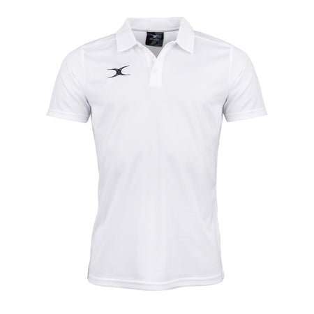 The Gilbert Photon II Polo Shirt by Gilbert is a white short-sleeve polo featuring moisture control, a collar with three buttons, and a small black logo on the left chest. Ideal for workout training or casual wear, it's shown against a white background.
