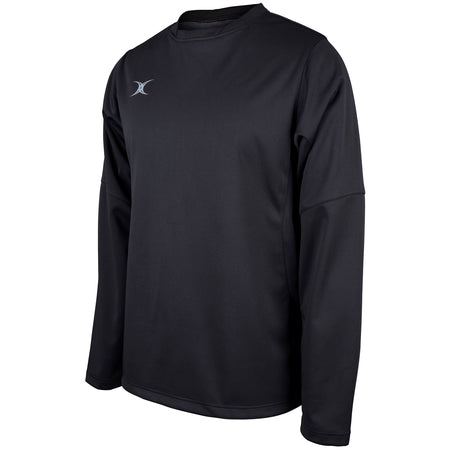 The Gilbert Pro Warm Up Top by Gilbert is a black long-sleeve athletic shirt featuring a crew neck and a small white logo on the left chest, made from breathable stretch fabric and shown on a plain white background.