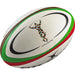 The Gilbert Harlequins Replica Rugby Ball by Gilbert is white with green and red stripes, a colorful harlequin figure in the center, and "HARLEQUINS" below—ideal for Gallagher Premiership rugby fans.