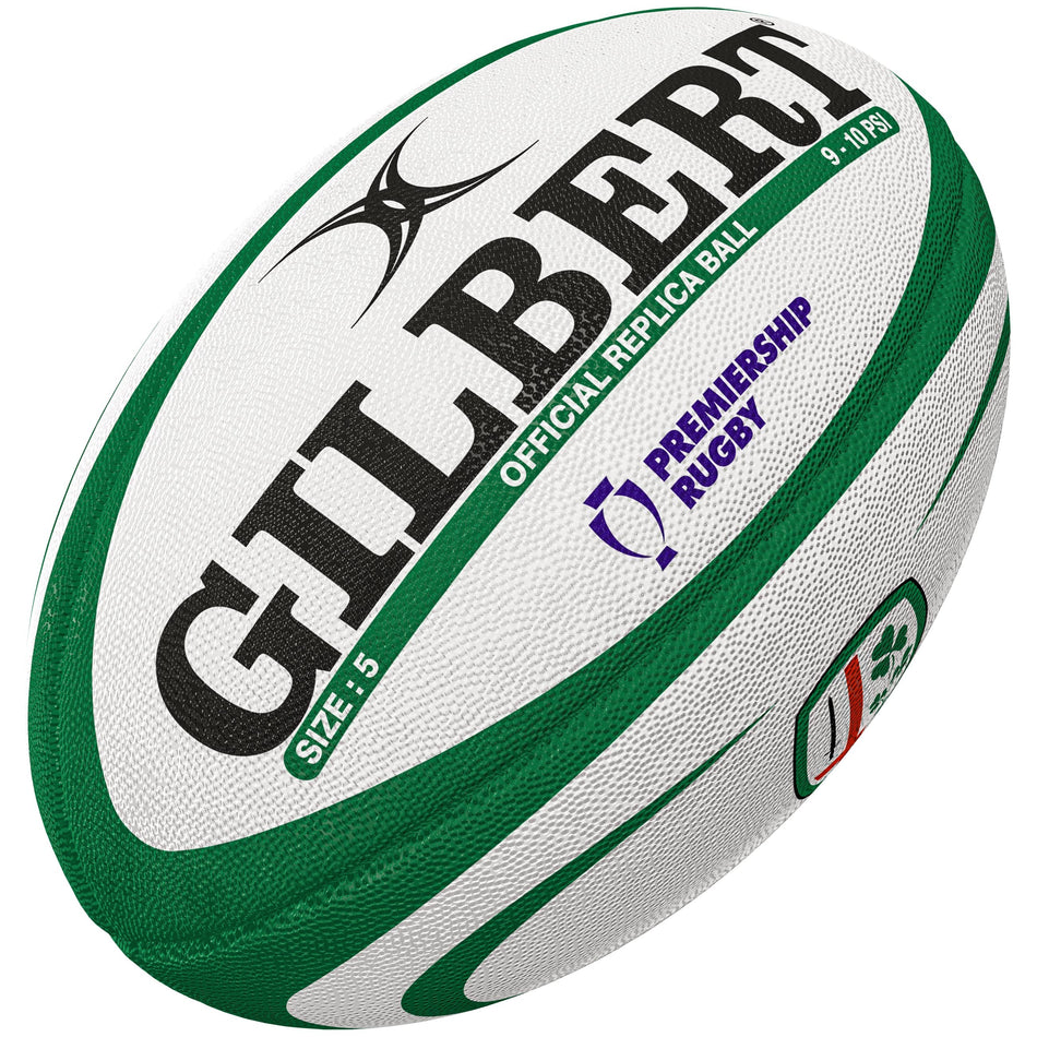 The Gilbert London Irish Replica Rugby Ball by Gilbert is white and green, features the team's logo, "OFFICIAL REPLICA BALL" and "PREMIERSHIP RUGBY" text, plus visible “SIZE: 5”—ideal for Gallagher Premiership Rugby supporters.