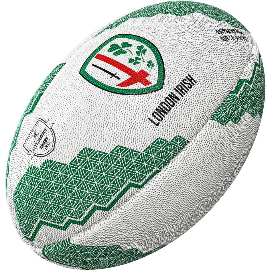 The Gilbert London Irish Supporter Rugby Ball by Gilbert is white with green geometric patterns, features the London Irish logo—a red cross with green shamrocks—plus "London Irish" text. Ideal for any London Irish fan from Gallagher Premiership Rugby.