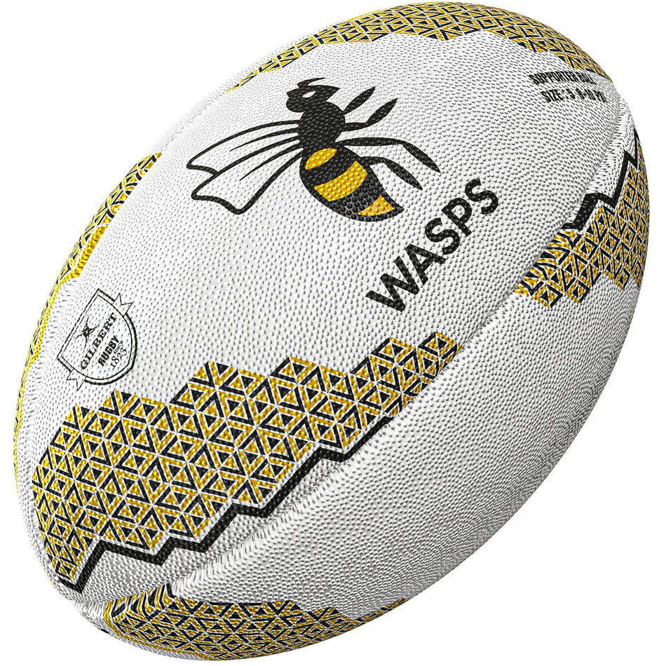 The Gilbert Wasps Supporter Rugby Ball by Gilbert features yellow and black geometric patterns, a large wasp graphic, and "WASPS" text—ideal for any rugby fan.