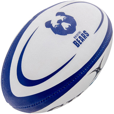The Gilbert Bristol Bears Replica Rugby Ball by Gilbert features a white and blue design with the Bristol Bears logo, making it perfect for any Premiership Rugby fan.