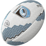 The Gilbert Cardiff Supporters Rugby Ball by Gilbert, featuring the Cardiff Rugby logo and geometric patterns in white and blue, is displayed against a white background—ideal memorabilia for United Rugby Championship fans.