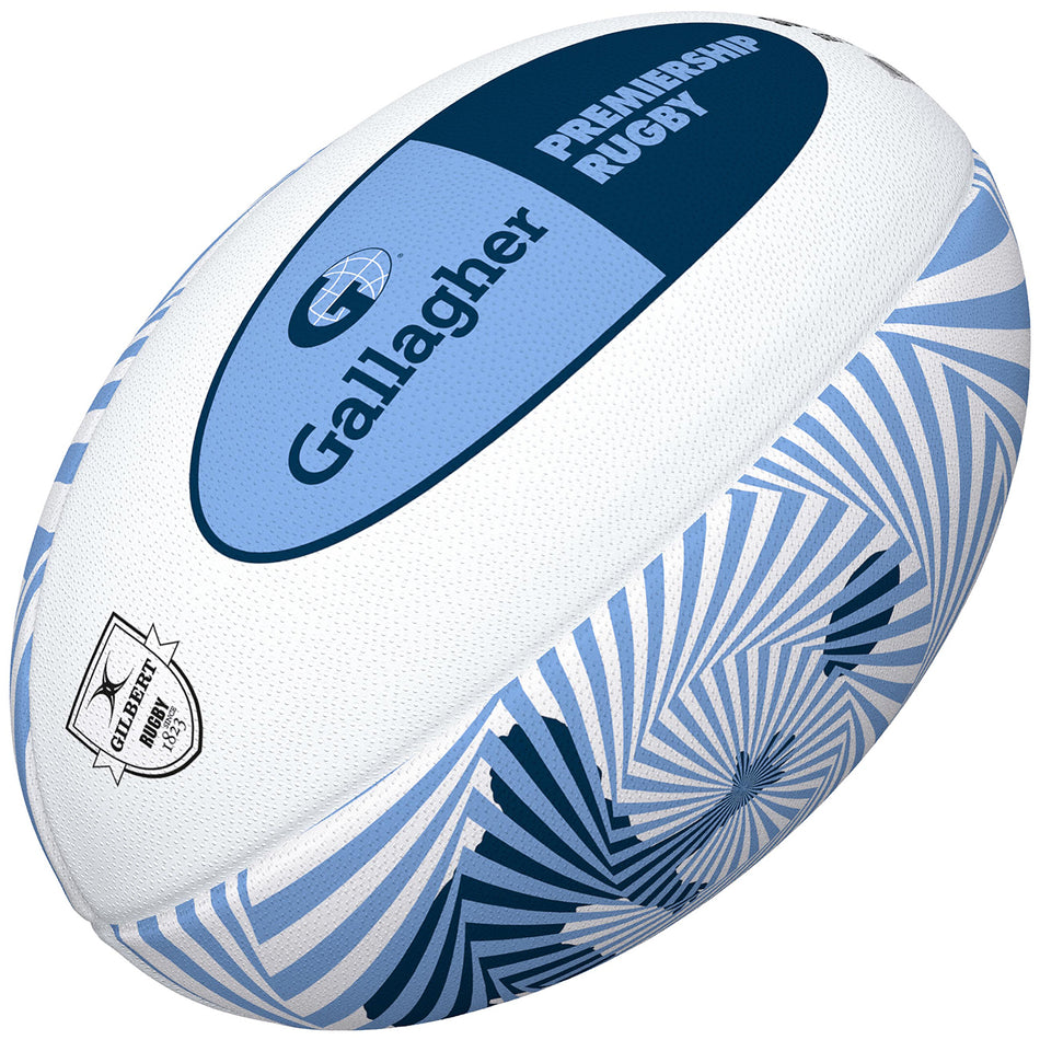 The Gilbert Gallagher Premiership Supporter Rugby Ball is white and blue with a geometric swirl, Gallagher Premiership Rugby logo, Gilbert branding, and "Official Replica" text.