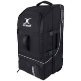 The black Gilbert Club Tour Wheeled Holdall is a large sports bag with handles, zippered compartments, side straps, wheels, and the Gilbert logo printed in white on the front and side.