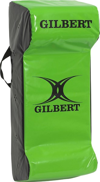 The Gilbert Tackle Wedge Junior by Gilbert is a green and black rectangular wedge with high-density foam, side handles, and the Gilbert logo on the front.