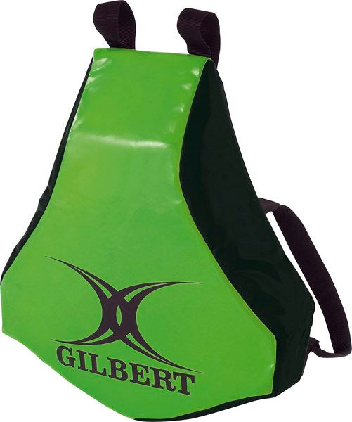 The Gilbert Body Wedge is a green and black rugby tackle shield with shoulder straps, perfect for tackling practice. This must-have training tool features the Gilbert logo on the front.