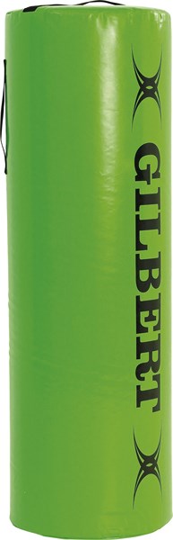 The Gilbert Tackle Bag Senior 23KG is a bright green, cylindrical rugby training bag with black handles and "GILBERT" in bold black letters—perfect for sharpening contact skills.
