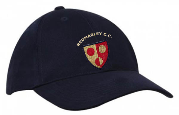 The Redmarley CC Baseball Cap by Martin Berrill Sports is black and features the club’s embroidered crest with red and gold circles and "REDMARLEY C.C." above it.