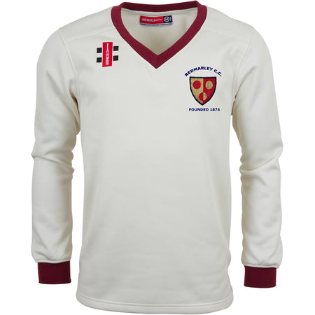 The Redmarley CC Junior Pro Performance Sweater by Gray Nicolls is a cream, long-sleeved top with maroon trim and club badges, featuring "Redmarley C.C. Founded 1874" on the chest. Made from sport-specific fabrics for optimal comfort and performance.