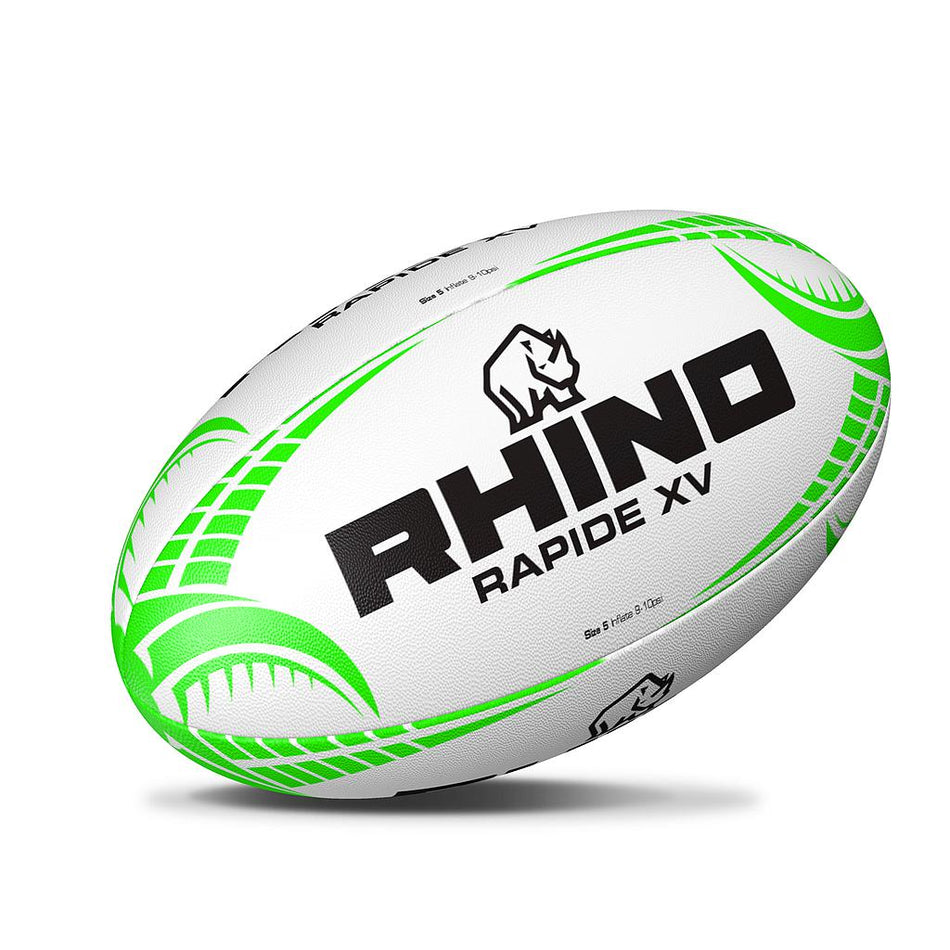 The Rhino Rapide XV Rugby Ball by Rhino is a white, hand-stitched ball with green accents, bold black "RHINO RAPIDE XV" text, and a rhinoceros logo, shown on a plain white background.