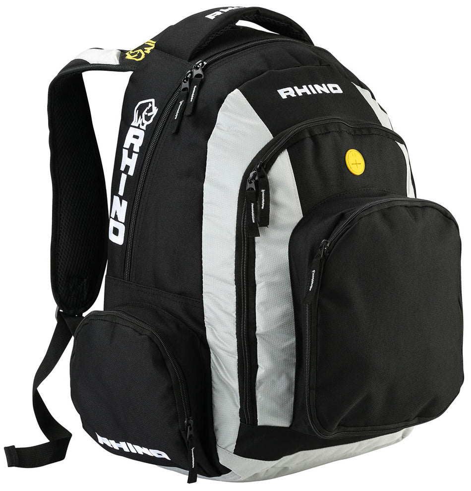 The Rhino Rucksack by Rhino is a black and gray 32L laptop backpack with multiple zippered compartments, side pockets, padded shoulder straps, top handle, and features the RHINO logo plus a yellow circular emblem on the front pocket.