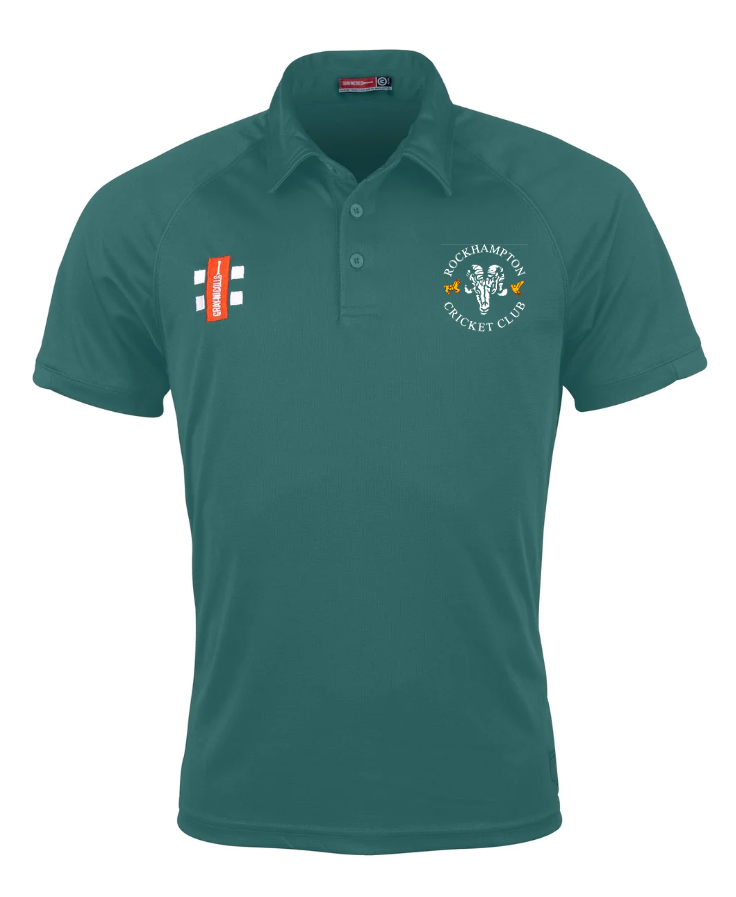 The Gray Nicolls Rockhampton CC Matrix V2 Polo Shirt - Junior features moisture-wicking fabric, a "Rockhampton Cricket Club" and bull logo on the left chest, plus a small orange and white patch on the right—ideal for training.