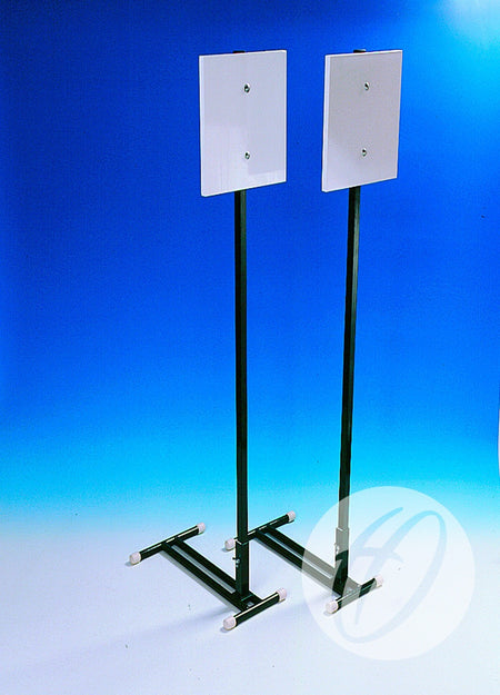 Two Harrod Sport Stoolball Wickets feature square white panels atop steel stands with T-shaped bases and white caps, set against a gradient blue background—ideal for cricket pitches or as official Stoolball equipment.