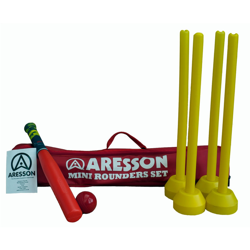 The Aresson Mini Rounders Set by Aresson includes a red carry bag, four yellow stumps with bases, a red bat and ball, and an instruction leaflet—ideal as a beginner’s rounders kit for kids.