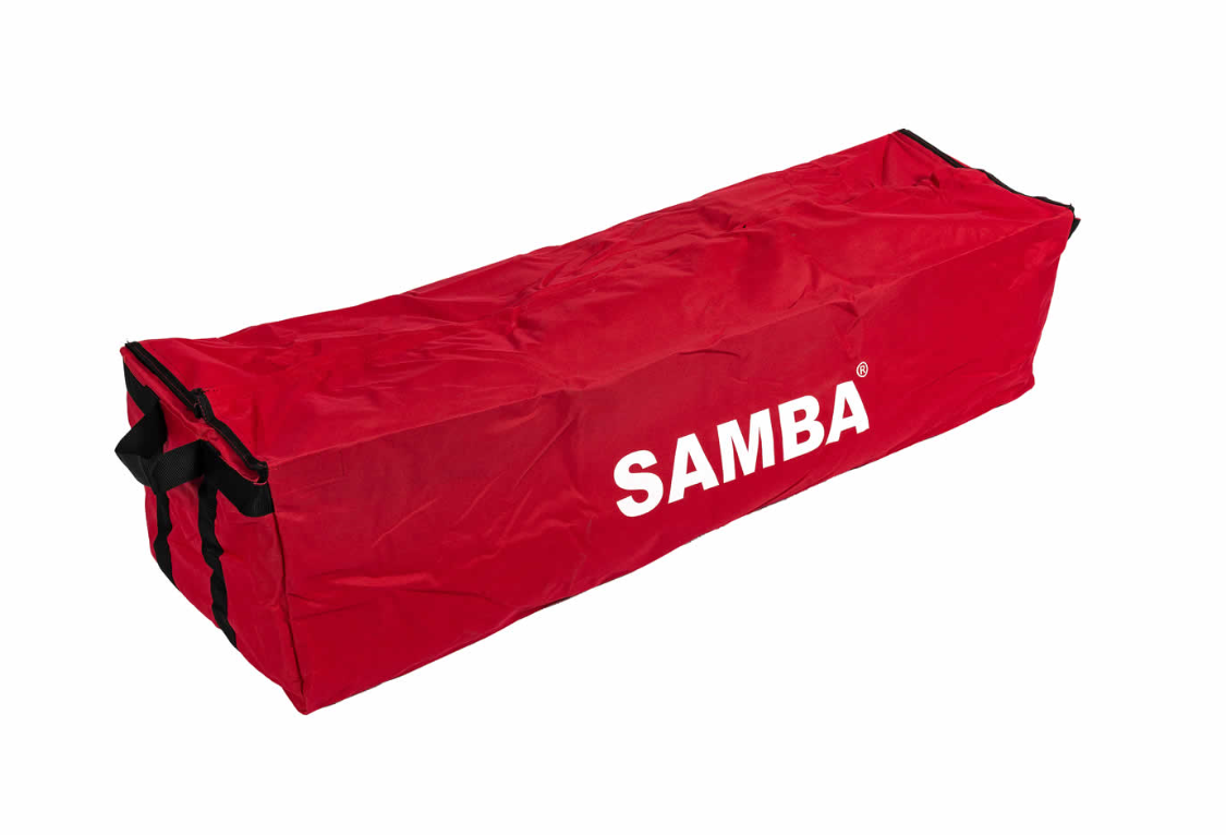 The Samba Sports Samba 16 x 7 Match Goal Carry Bag is a large red rectangular bag with black handles and "SAMBA" in white letters, designed to fit a 16 x 7 football goal, shown on a white background.