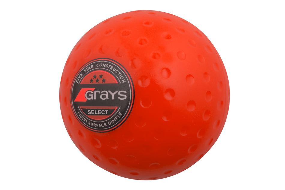 The Grays Select Hockey Ball is a bright orange, dimpled ball featuring the black and silver Grays Select logo, marked "Five Star Construction Multi Surface Dimple"—an FIH-approved, premium-quality ball for top performance by Grays.