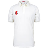 The Burwash CC Matrix V2 Short Sleeve Match Shirt by Martin Berrill Sports is a plain white cricket shirt with short sleeves, a collar, and a red, black, and white logo on the left chest. Made from lightweight polyester for match-day comfort.