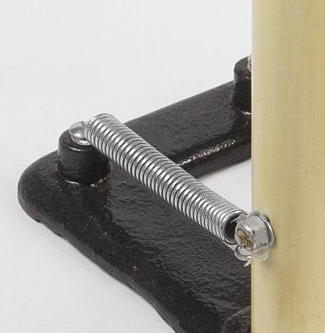 Close-up of the Martin Berrill Sports Replacement Spring for Spring Back Stumps, secured with screws between a black metal base and vertical beige rod for sturdy, reliable stump action.
