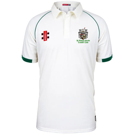 The St Philips North CC Matrix V2 Short Sleeve Match Shirt by Martin Berrill Sports is a white match shirt with green accents on the collar and sleeves, featuring embroidered logos and text on both sides of the chest.