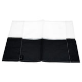 The Precision Training Precision Corner Flags placemat features four sections in black and white, resembling a coloured corner flag, with visible white edge stitching and a black fabric tag on the left side.