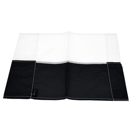 The Precision Training Precision Corner Flags placemat features four sections in black and white, resembling a coloured corner flag, with visible white edge stitching and a black fabric tag on the left side.