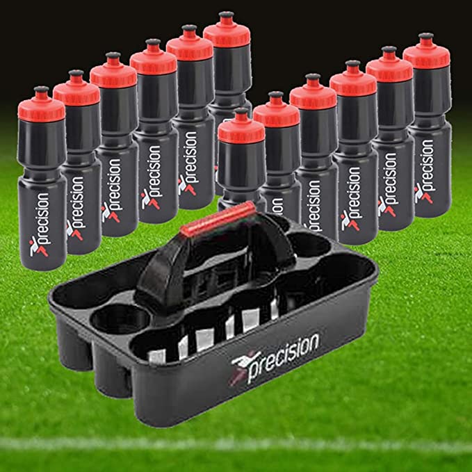 Twelve Precision Training Black 750ml sports water bottles with red caps are arranged behind a Precision Training Water Bottles & Carrier, all on a green grass field.