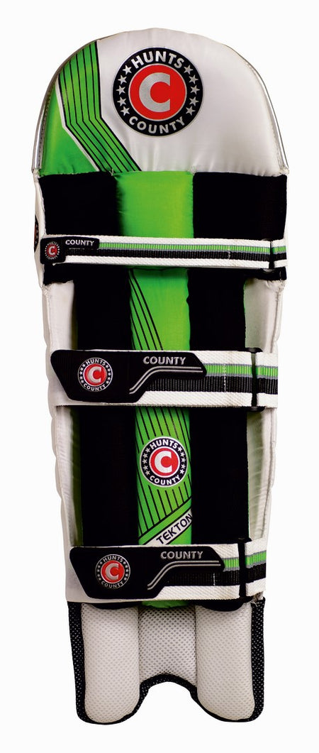 The Hunts County Tekton Junior Batting Pads feature a green, black, and white design with three black straps and Hunts County branding; these ambidextrous pads offer versatile protection for young cricket players.