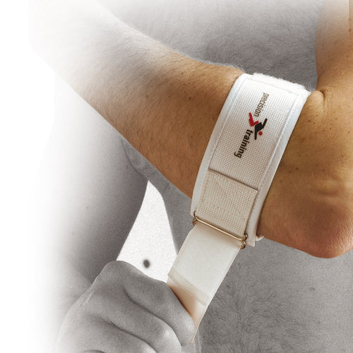 A close-up of a person fastening the Precision Training Precision Tennis Elbow Strap, a white lightweight compression wrist support with "Precision Training" and a logo on the strap.