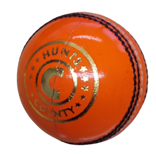 The Hunts County Turf King Senior Match Cricket Ball is orange leather with black stitching and a gold Hunts County logo featuring stars around the text.