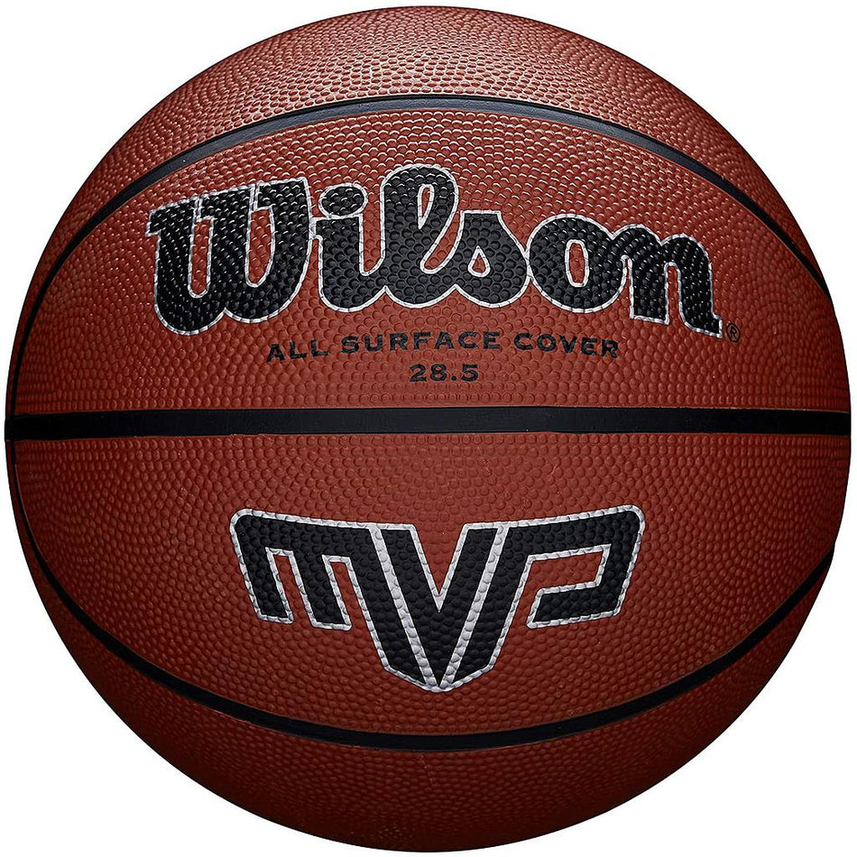A close-up of the Wilson MVP Basketball shows its brown, textured surface with the Wilson logo and "ALL SURFACE COVER 28.5" text—making this durable rubber basketball ideal for school use, indoors or outdoors.