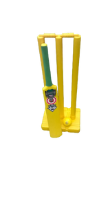 The Hunts County Beach Cricket Set features a yellow plastic bat with a green handle, three stumps, and a yellow ball, all displayed on a white background.