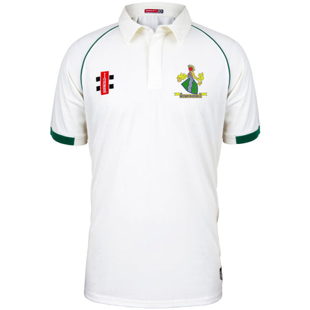 The Gray Nicolls Westbury-on-Severn CC Matrix V2 Short Sleeve Match Shirt is a white cricket shirt with green trim on the sleeves and collar, featuring two embroidered chest logos—one with a red stripe and one with a crest.