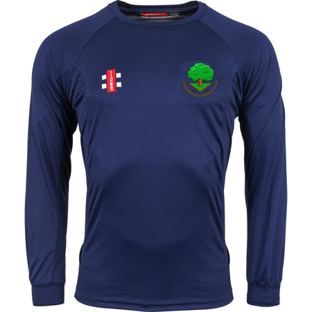 The Gray Nicolls Woodmancote CC Long Sleeve Matrix V2 Navy Training Shirt features a crew neck, red and white chest logo, green tree emblem with yellow text, and moisture-wicking fabric—perfect for training.
