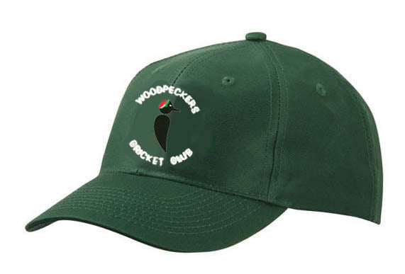 The Woodpeckers CC Baseball Cap by Martin Berrill Sports is dark green, featuring the club logo—a black woodpecker with a red crown—and "WOODPECKERS CC" in white lettering around the bird.