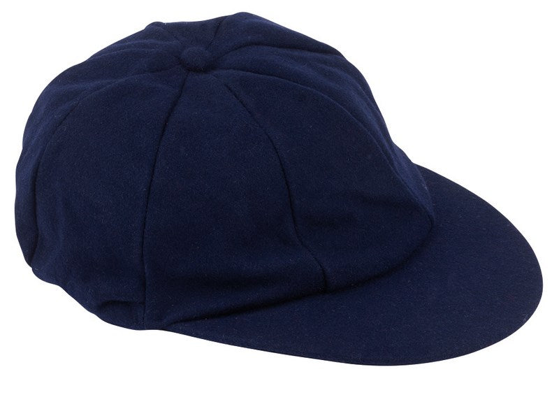 The Hunts County Traditional Cricket Cap in navy blends vintage cricket style with multiple stitched panels and a flat brim, shown on a white background.